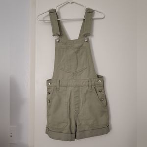Green overall shorts